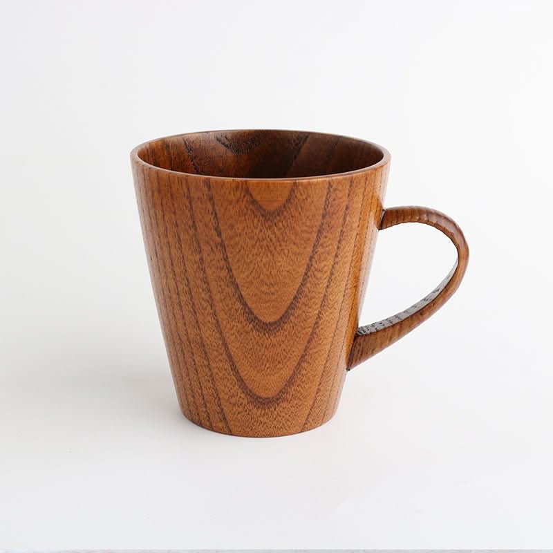 Japan imported traditional lacquered chestnut wood mug with natural grain on white background.